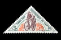 A postage stamp of Republique Du Dahomey shows a postman riding a cycle for delivery