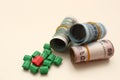 Bangladeshi currency or taka Roll and small toy house Royalty Free Stock Photo