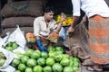 Bangladeshi man selling papaya at the market,dhaka,karwanbazar,