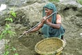 Bangladeshi older women working in gravel quarry