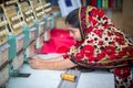 Bangladesh Ã¢â¬â August 6, 2019: A Bangladeshi woman garments worker working with Computerized Embroidery Machine at Madhabdi,