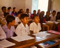 Young boys sitting around a classroom unique photo