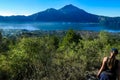 Bangli - A girl hiking on Mount Batur