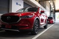 BANGSAN, THAILAND MAY 2018 : This car all new cx 5 mazda brand japan red color on parking street for customer so parked in showro Royalty Free Stock Photo