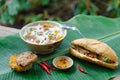 Banh Canh - Rice noodles soup with fried fish ball and Banh Mi Cha Ca - Vietnamese bread with fried fish and chili fish sauce Royalty Free Stock Photo