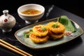 Banh Khot, Vietnnamese mini pancakes with toppings and sweet and sour sauce