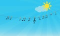 Musical notes and treble clef hanging on a rope against blue sky Royalty Free Stock Photo