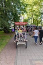 Family bicycle for four people and couples in love. Four wheels bicycle.