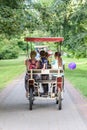 Family bicycle for four people and couples in love. Four wheels bicycle.