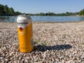 Banjalucko beer on the beach next to the artificial lake ManjaÃÂa on the plateau ManjaÃÂa near Banja Luka, a tourist attraction Royalty Free Stock Photo