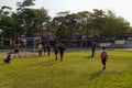 A group of children playong football