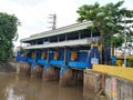 Banjir kanal barat, Jakarta, Indonesia - November 3, 2020 :Yellow and blue sluice gates are used to regulate water discharge when