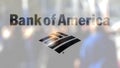 Bank of America logo on a glass against blurred crowd on the steet. Editorial 3D rendering