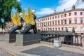 Bank bridge with golden-winged griffons over Griboyedov canal, Saint Petersburg, Russia