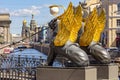 Bank bridge with golden-winged griffons over Griboyedov canal, Saint Petersburg, Russia