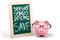 Piggy Bank and Chalkboard with Spend and Save Royalty Free Stock Photo