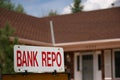 Bank Repo Sign on Home For Sale