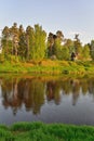 The Bank of the river Oredezh with trees Sunny day Royalty Free Stock Photo