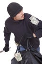 Bank robber running with money Royalty Free Stock Photo