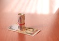 Bank Roll of Ukrainian hryvnia on the table Royalty Free Stock Photo