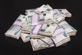 Bank of Russia money tickets are 1000 rubles background. lot of money laid out in bundles of 100,000 rubles on a black background