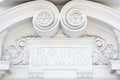 Bank sign in stone on decorated facade