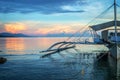 Banka, traditional filipino fishing boat at sunset, Cebu island The Philippines