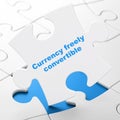 Banking concept: Currency freely Convertible on puzzle background Royalty Free Stock Photo