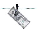 The banknote one hundred dollars on the clothesline isolated Royalty Free Stock Photo