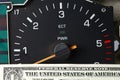 Banknote put tachometer gauge scene. Royalty Free Stock Photo