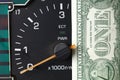 Banknote put tachometer gauge scene. Royalty Free Stock Photo