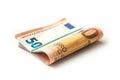 Banknotes bundle of fifty euros money on white backgr