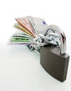 Banknotes chained and locked Royalty Free Stock Photo