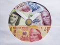 banknotes and coin of mexican pesos with paper forming clock figure, background and texture