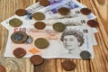 Banknotes and coins from the United Kingdom. Royalty Free Stock Photo