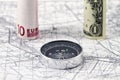 Banknotes of the Euro and the dollar with compass Royalty Free Stock Photo