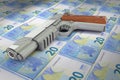 Banknotes 20 euros verso gun trafficking dirty money full frame concept