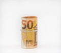 Banknotes fifty 50 euros in a roll with an elastic band. European currency to save. Close-up, white background. The concept of the Royalty Free Stock Photo