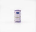 Banknotes five hundred and 500 euros in a roll with an elastic band. European currency to save. Close-up, white background. The co Royalty Free Stock Photo