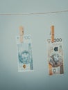 Banknotes on laundry line Royalty Free Stock Photo