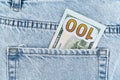 banknotes in the pocket of blue jeans. one hundred dollar bill. Royalty Free Stock Photo