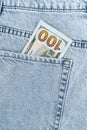 banknotes in the pocket of blue jeans. one hundred dollar bill. Royalty Free Stock Photo