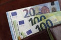 Banknotes stick out of the wallet, Euro currency