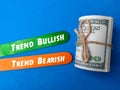 Banknotes with text Trend Bullish and Trend Bearish