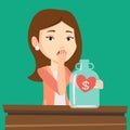 Bankrupt woman looking at empty money box