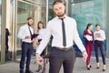 Bankrupt. A young man in black trousers and a white shirt demons Royalty Free Stock Photo