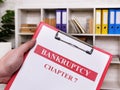 Bankruptcy chapter 7. The manager holds the sheets. Royalty Free Stock Photo