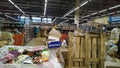 Bankruptcy of supermarket the largest retailer. Clutter trash and scattered goods on dirty floor.