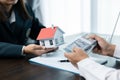 Banks approve loans to buy homes. Real estate agents explain the document for customers who come to contact to buy a house, buy or