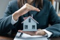 Banks approve loans to buy homes. Real estate agents explain the document for customers who come to contact to buy a house, buy or Royalty Free Stock Photo